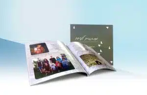 חוברת זיכרון פתוחה עם תמונות והכותרת "מכתבים לעידו"