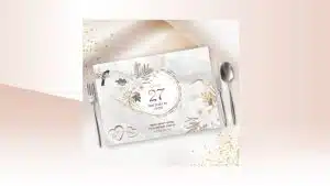 ברכת יום הולדת לחגית 27, עיצוב פרחוני אלגנטי על שולחן.